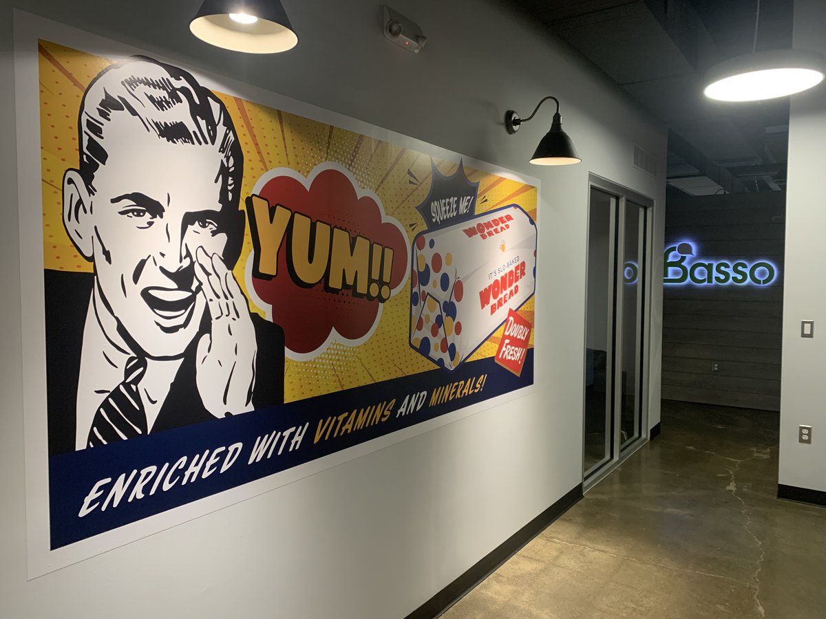 Office Highlight! Did you know this artwork in our office was created by our designer Asia? The retro theme was meant to look like a vintage Wonder Bread billboard and is a testament to our design roots!