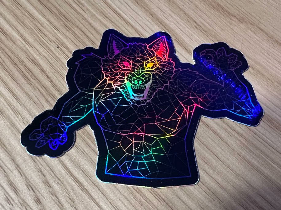 JeremyNDooley's tweet photo. Hey y'all! Super happy to announce the launch of some new merch over on https://t.co/6TkKkqPLAA! Preorders are now open for the bisexual werewolf shirt, hoodie, and holo stickers. A portion of the profits from this merch will go directly to The Trevor Project. Keep being yourself https://t.co/7NBXRHcXqt