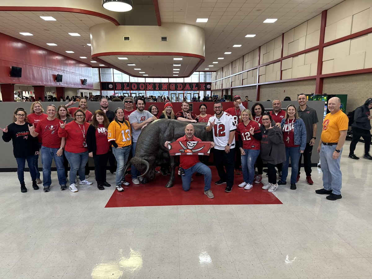 BloomingdaleSHS's tweet photo. BSHS faculty wore their favorite Bucs gear today to “Raise the Flags”! Go Bulls and Go Bucs! 🤘🏴‍☠️ https://t.co/Zqwq4u8orK