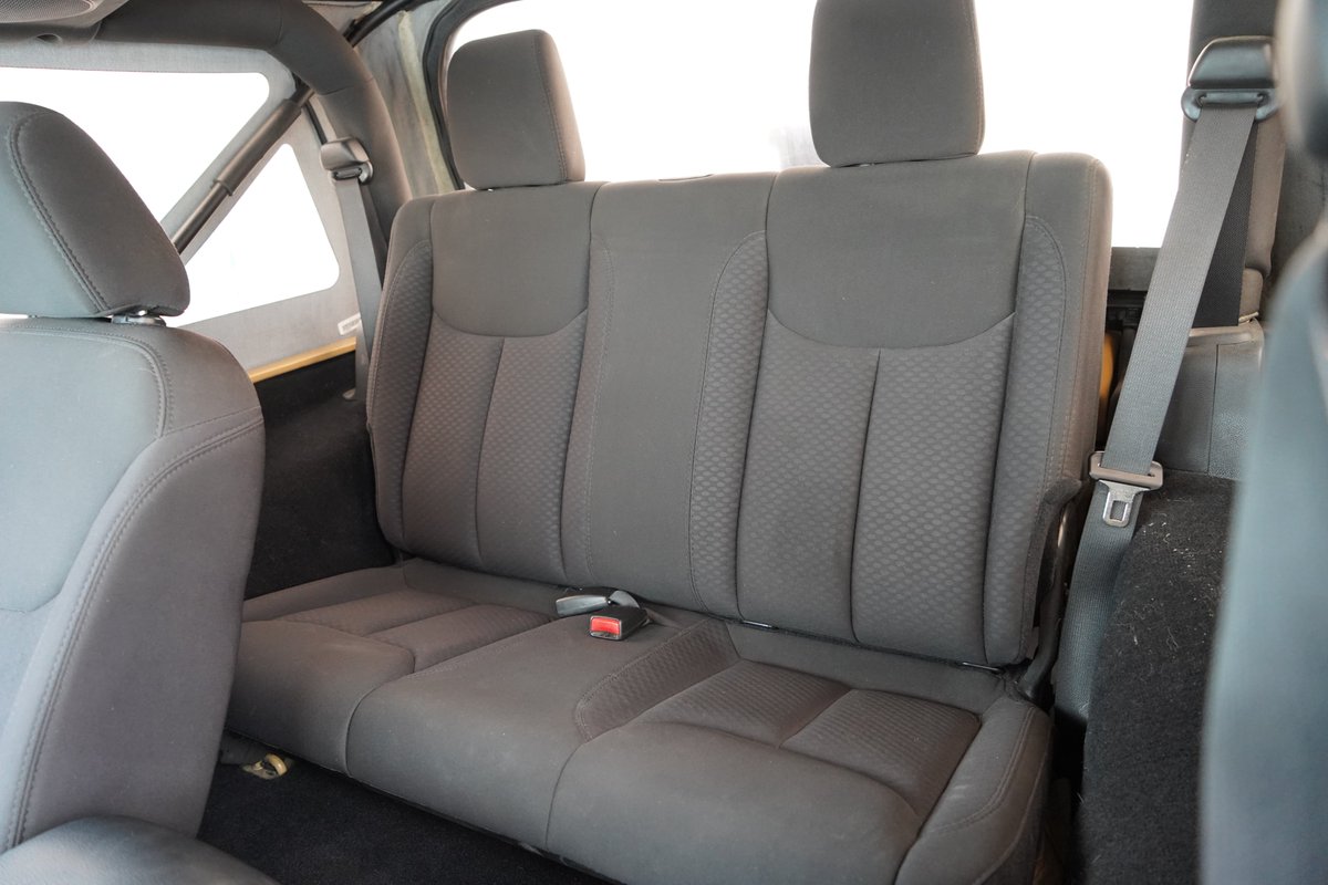 This 2014 Jeep Wrangler Sport has fewer than 100,000 miles, looks nice inside and out, and has a clean AutoCheck vehicle history report. See it at Preferred Auto on Lima Road in Fort Wayne. Call 260-489-0489 for details and availability.