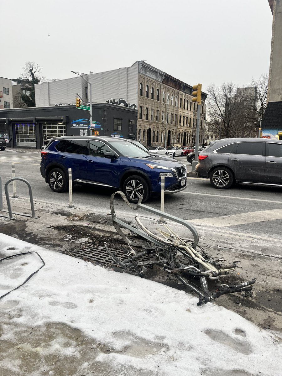 This is crazy. A good friend of mine and her 9 year old son had a green light to cross Mc Guinness Blvd around yesterday afternoon. Cars stop. But a truck comes racing towards them. She pulls her son back to the curb as the driver smashes thru bike racks crushing a #bikenyc!  1/3