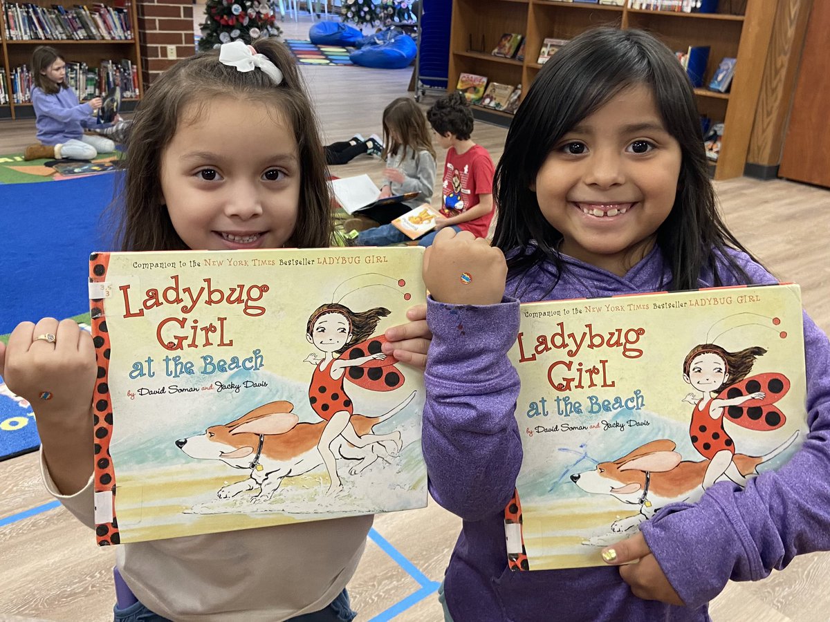 Twinning today in the media center! Matching books and superhero stickers for knowing their student numbers! #booktwins #readingismysuperpower