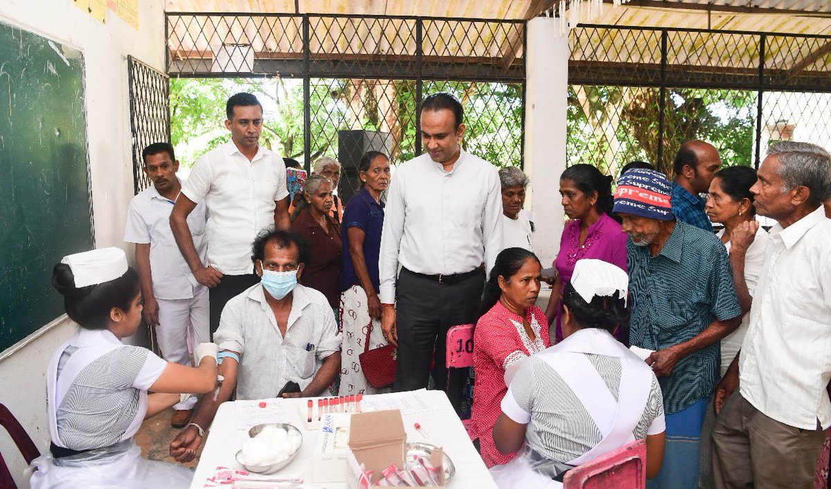 MoH_SriLanka's tweet photo. Suwa Udana mobile health clinic launched at Siwali Maha Vidyalaya, Galle, to uplift rural health. Led by Health Minister Dr. Ramesh Pathirana, this marks the first clinic of 2024. Minister connects with doctors and attendees. #Healthcare2024 https://t.co/qek34svOV4
