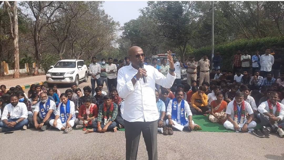 RSPraveenSwaero's tweet photo. ప్రొ.జయశంకర్‌ వ్యవసాయ విశ్వవిద్యాలయానికి (PJTSAU) చెందిన 100 ఎకరాల భూమిని ప్రభుత్వం కొత్త హైకోర్టు నిర్మాణానికి కేటాయించడాన్ని నిరసిస్తూ 12 రోజులుగా శాంతియుతంగా ధర్నా చేస్తున్న  విద్యార్థులకు సంఘీభావం తెలిపాము.

ప్రపంచానికి అన్నం పెట్టే రైతాంగానికి నూతన వంగడాలను సృష్టిస్తూ,ప్రపంచ ప్రఖ్యాతిగాంచిన వ్యవసాయ శాస్త్రవేత్తలను అందించిన వర్సిటీ భూముల్లో హైకోర్టు నిర్మాణం చేపడితే అక్కడ బయోడైవర్సిటీ దెబ్బతిని అరుదైన వృక్ష జాతులు, పక్షులు,జంతువుల ఉనికి ప్రశ్నార్థకంగా మారుతుంది. ఖజానాలో ఇంకా డబ్బులుంటే కొత్త హైకోర్టును వేరే ప్రదేశంలో కట్టండి. హైదరాబాదు చుట్టుపక్కల చాలా ఖాళీ భూములు గుట్టలల్ల ఉన్నయి.

హైకోర్టు నిర్మాణానికి #BSP ఏమాత్రం వ్యతిరేకం కాదు. కానీ ముఖ్యమంత్రి @revanth_anumula గారు రాష్ట్ర మంత్రివర్గంతో సహా అగ్రివర్సిటీలో పర్యటించి, విద్యార్థులతో ప్రొఫెసర్ల తో చర్చలు జరిపితే తప్ప అక్కడి సమస్యలు అర్దం కావు. 

అందుకే తక్షణమే ప్రభుత్వం https://t.co/artLfmUBzf.55 ను రద్దు చేసి, వర్సిటీ భూముల్లో కాకుండా ఇతర ప్రభుత్వ భూముల్లో హైకోర్టును నిర్మించాలని #BSP డిమాండ్ చేస్తున్నది.

Stood by Telangana Agriversity Students in solidarity who have been fighting to save precious flora and fauna in their university lands from the Government. Nobody objects to the government’s decision to build a new high court, if it is done on a barren land (with minimum destruction) which is close to Hyderabad. But why only the lands of biodiversity parks and botanical gardens which were painstakingly nurtured for decades by the students and scientists? 

Is it because you want to slowly make this area a real estate hub close to Shamshabad Airport? Already some land is given to Prestige Group!

Is it because the voice of students here can be silenced easily as they are from Bahujan communities surviving on government scholarships? 

If public purpose is the only cause for acquisition of university lands, why can’t the government acquire govt lands which are aplenty close to airport. Govt doesn’t want to explore such possibility because it wants to hand over such lands to sharks aka real estate companies who build ultra-luxurious villas for the high and mighty. 

I request hon’ble high court to strike down GO 55 and ask the government to come up with a fresh proposal for land acquisition for new high court building, if it still has money in its coffers.

@TelanganaCS 
@TelanganaCMO 
@PjtsauIndia