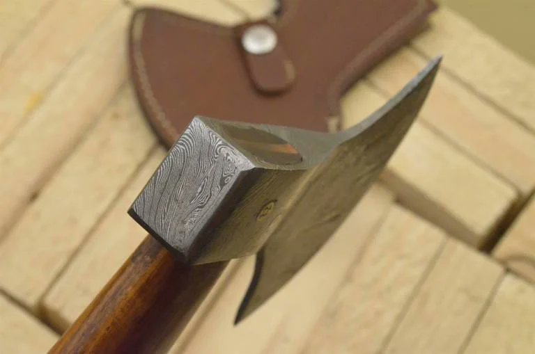 NMTWorld's tweet photo. CUSTOM MADE DAMASCUS AXE – ROSE WOOD HANDLE

BLADE : DAMASCUS

HANDLE : ROSE WOOD HANDLE

SHEATH : COW HIDE LEATHER

E FOR EDGE

H FOR HEAD

L FOR LENGTH

Blade Size: 5.6

Handle Size: 5 https://t.co/2hUHCw6D1J