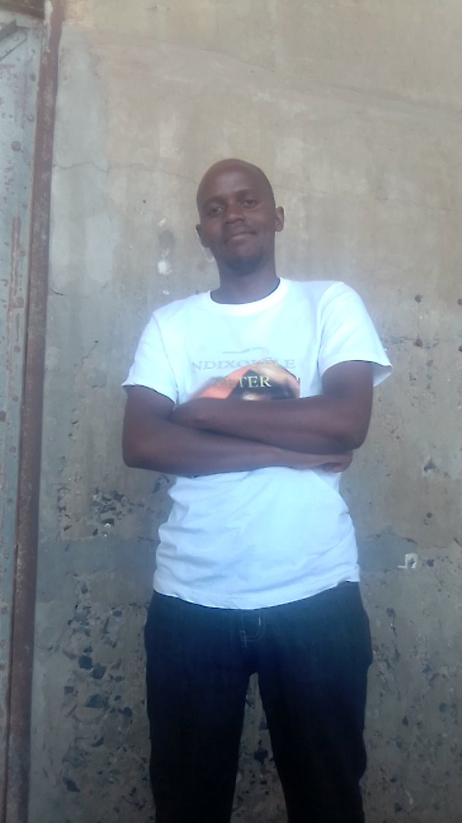 Mandilakhe Author came from College of Cape Town City Campus Motivating students👏 and took a photo fitting the New T-shirt printed with Ndixolele Peter Book Cover 👌