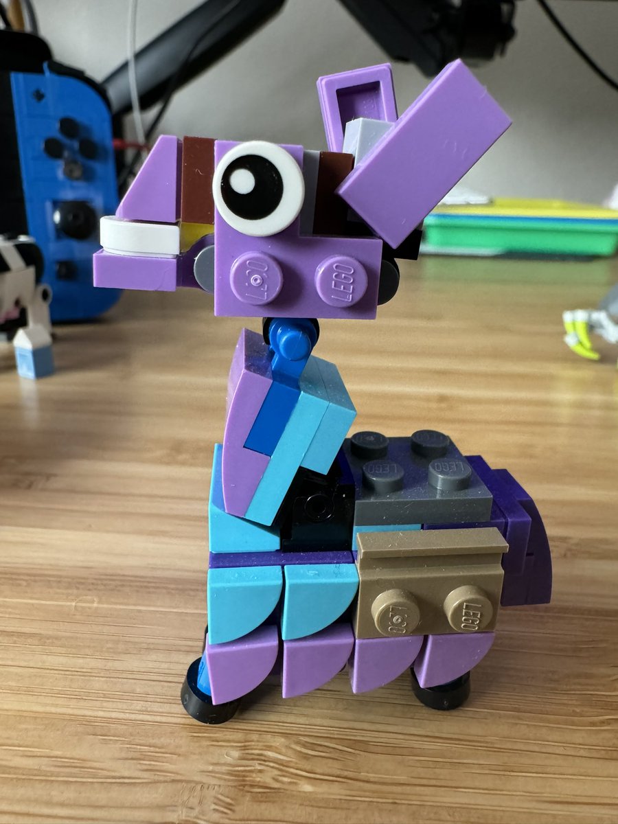 oracle_chick's tweet photo. My @LEGOFortnite builds designed by @BrickinNick - these certainly brighten up my desk and keep my spirits high all day long. #yeslego #legoislife 💜 https://t.co/dD3AsAB2nk