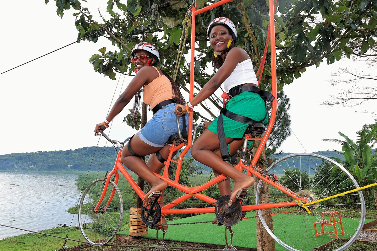 DivineResort1's tweet photo. "#ZIPLINEAdventure: Ride high above the serene lake, immersed in nature's beauty. #BikeThrills #NatureEscape" https://t.co/5mkiDqQ69K
