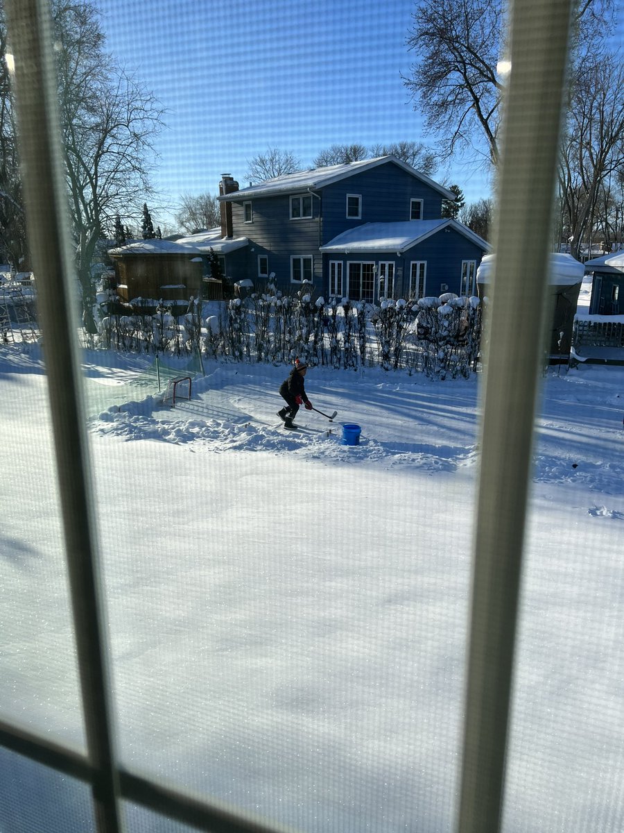 badgerhockeyfan's tweet photo. Out in snow pants and multiple layers in -2 degrees practicing his stickhandling before this afternoon’s game… I’d call him nuts, but we’ll just go with passionate… #backyardicerinks #backyardrinks #youthhockey https://t.co/Hh4f0wTzXr