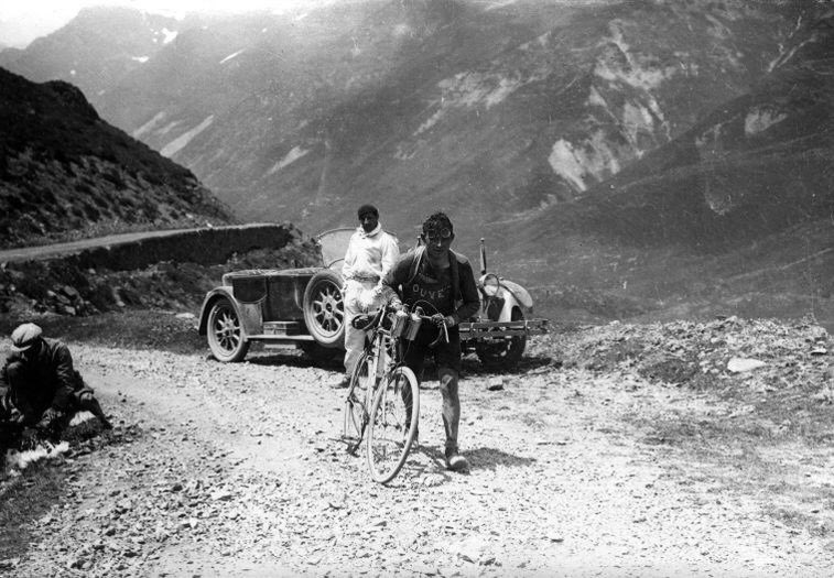 The Belgian Maurice Geldhof is climbing part of the Aubisque on foot. Tour de France 1928. (Stage Hendaye-Luchon, 387 km). 
•
#cyclingblog #cyclingculture #cycling #bikelife #cyclist #roadbike #cyclingtips #roadcycling #tourdefrance #giroditalia #vintagecycling #retrocycling