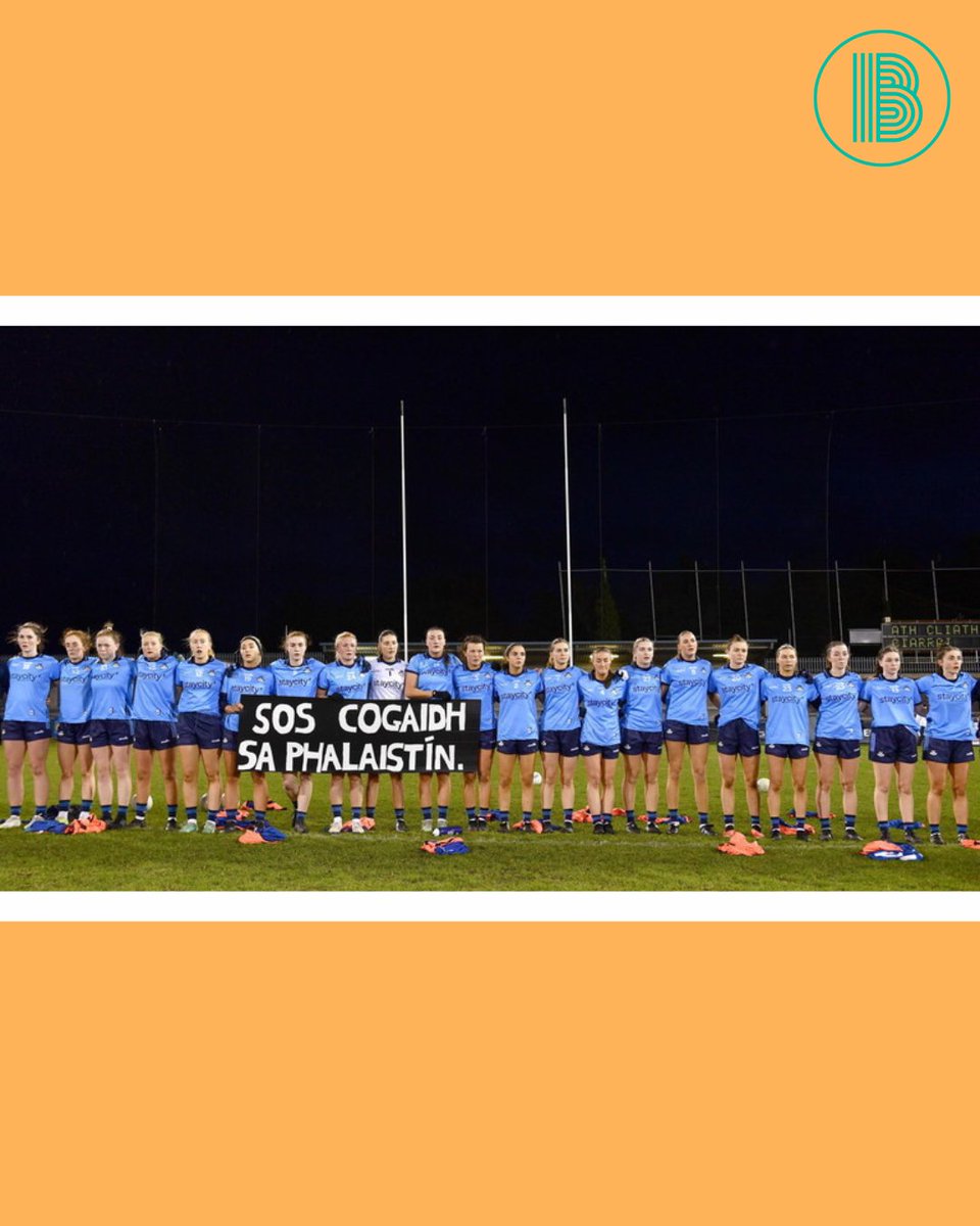 The Dublin ladies footballers hold a sign that reads 'SOS COGAIDH SA PHALAISTÍN' (Ceasefire in Palestine) before throw-in in tonight's League opener against Kerry in Parnell Park.