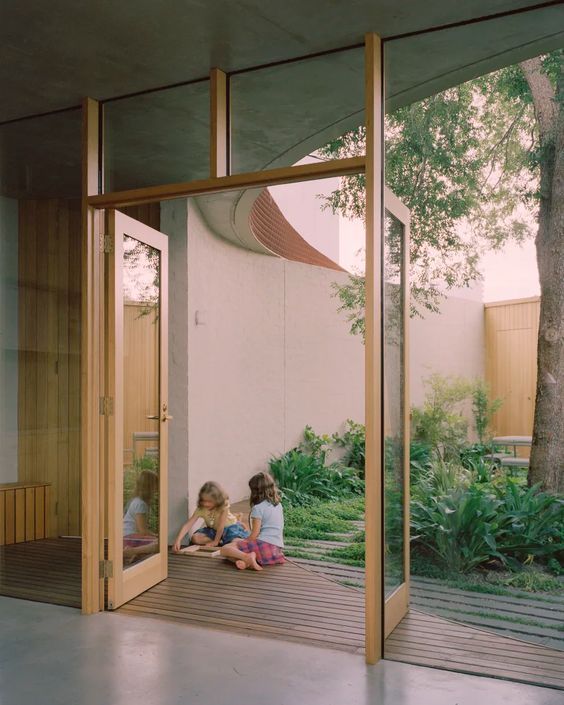 things the world needs more of. skylights, curved walls, wooden interiors, and indoor outdoor living spaces.