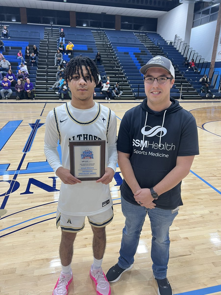 Lloyd Elmore Defensive Excellence Award goes to Earl Liverpool from <a href="/ACHS_Hoops/">Althoff Basketball</a>
Pictured with <a href="/SSMHealthSM/">SSM Health Sports Medicine</a>  rep Thomas Dannenberg.