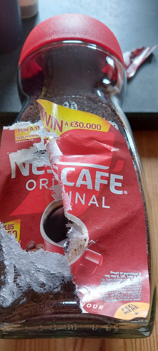 badgergk's tweet photo. @NESCAFE I've just found out how you can give away £30,000 pounds so easily.  Your not supposed to be able to reveal the code under the label. Good plan. https://t.co/w67FPyMaib