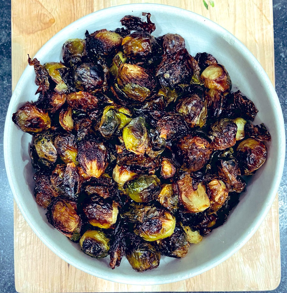 Roasted Brussels, olive oil, salt and pepper. We like them so some of the leaves are almost crunchy. 
To done for you?
#Brusselsprouts #roastedveggies