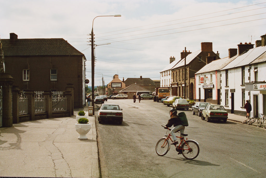 Market Square, Bagenalstown, County Carlow, 1991 by Padraig J. Laffan.
•
#cyclingblog #cyclingculture #cycling #bikelife #cyclist #roadbike #cyclingtips #roadcycling #tourdefrance #giroditalia #vintagecycling #retrocycling #cyclinghistory #cyclingstories #labellabicicletta