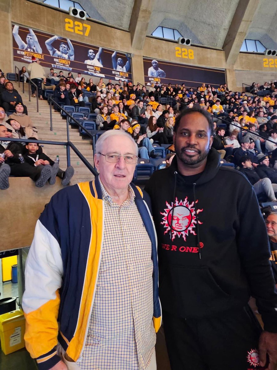 Two WVU Sports Hall of Famers - former coach Gale Catlett and forward Darryl Prue taking in Saturday’s Kansas victory at the Coliseum. Photo from Darryl’s Facebook page. @WVUhoops