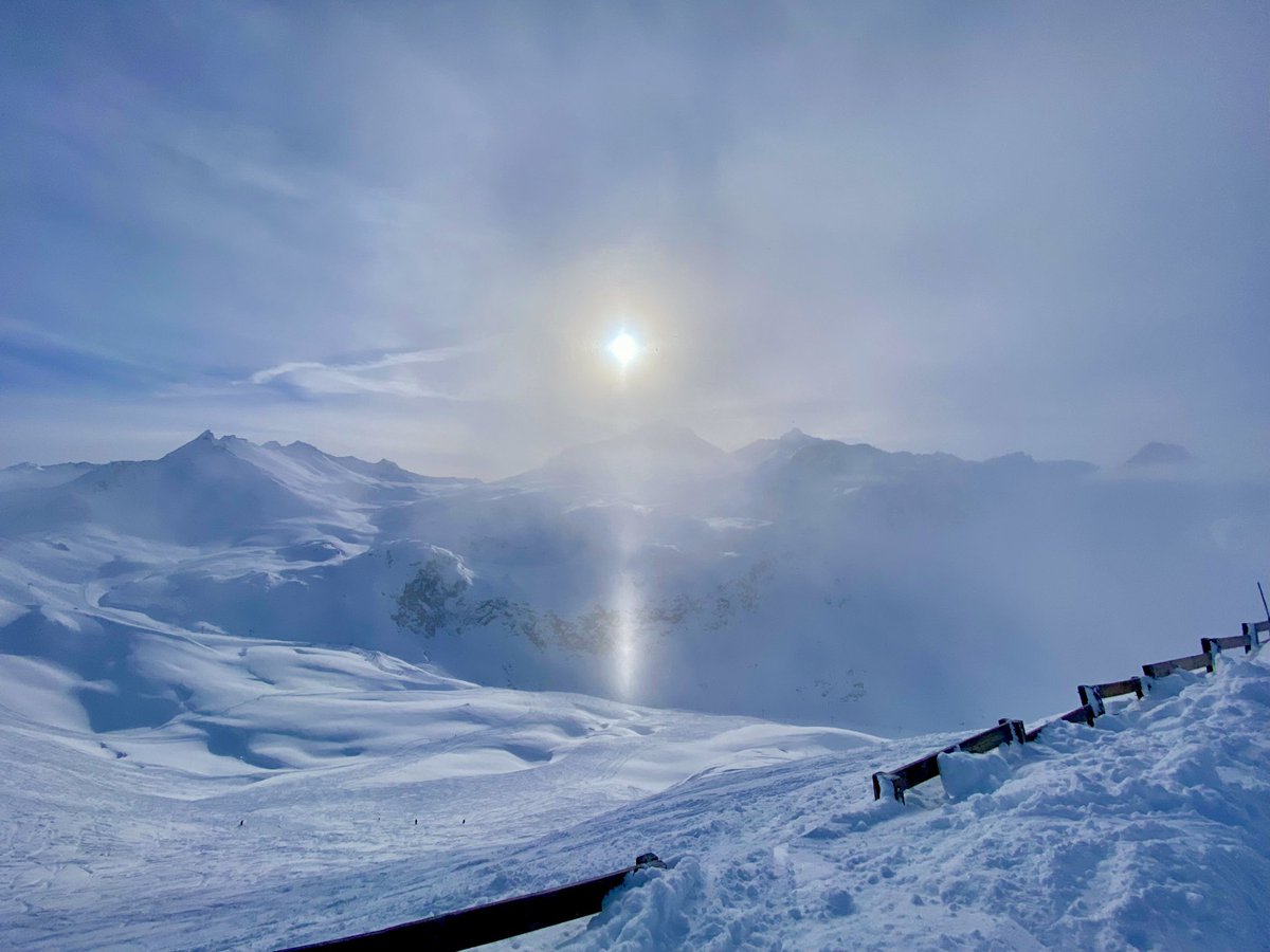 ABrodrip's tweet photo. Can anyone tell me what this phenomenon is called.  It was snowing and the sun created an interesting bright spot. https://t.co/ysjeQEda8O