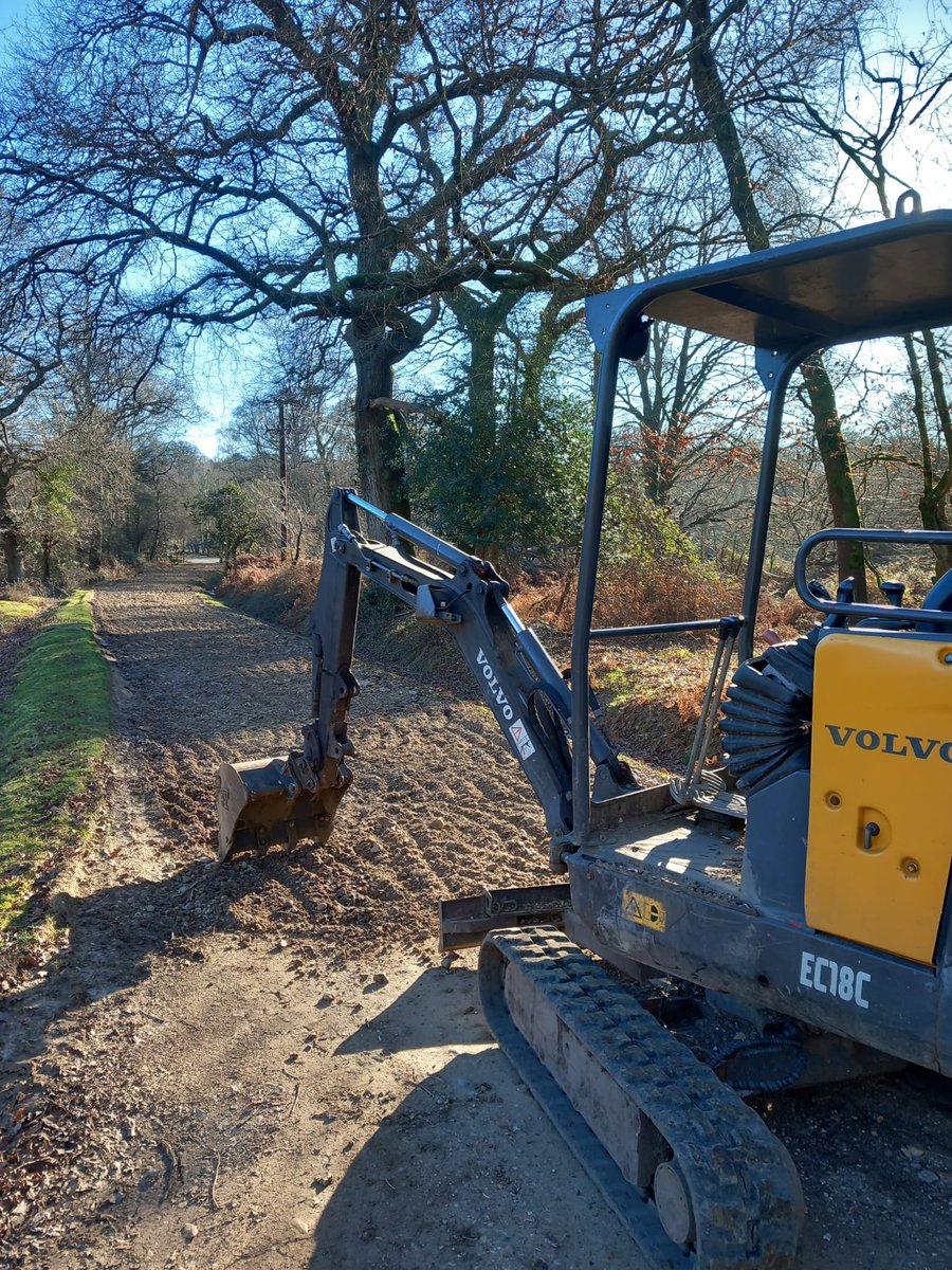 After a harsh winter of rain filled pot holes Track restoration in the beautiful New Forest.