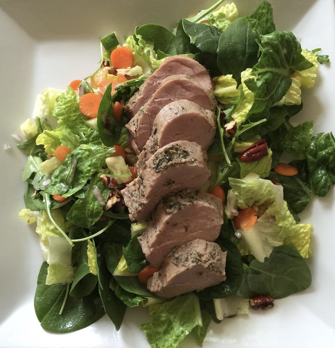 TheRealJazzChef's tweet photo. Sous vide herb roast pork on greens with oranges and pecans in a blood orange vinaigrette. https://t.co/r1z9dyyiFL