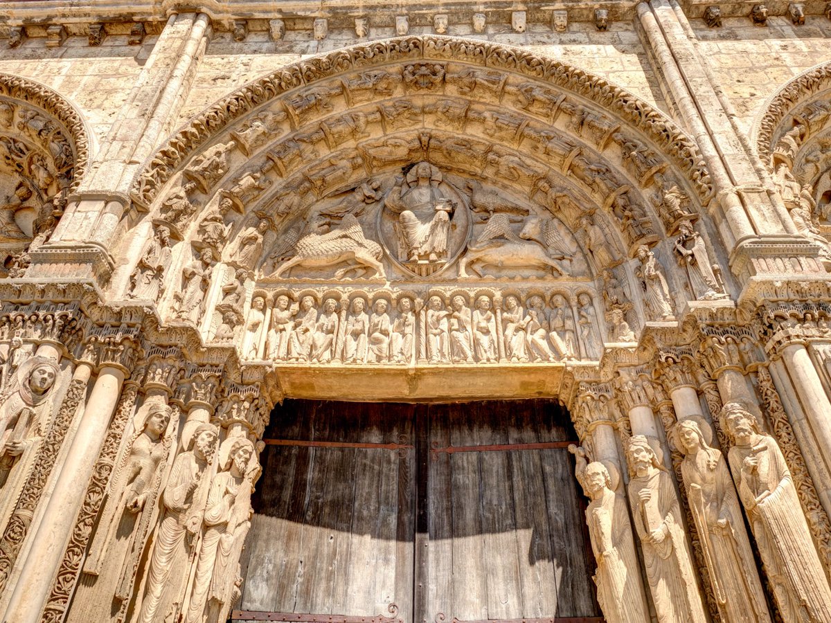Chartres. Stories written in stone. Those old doors are priceless. Wanderers must see this.