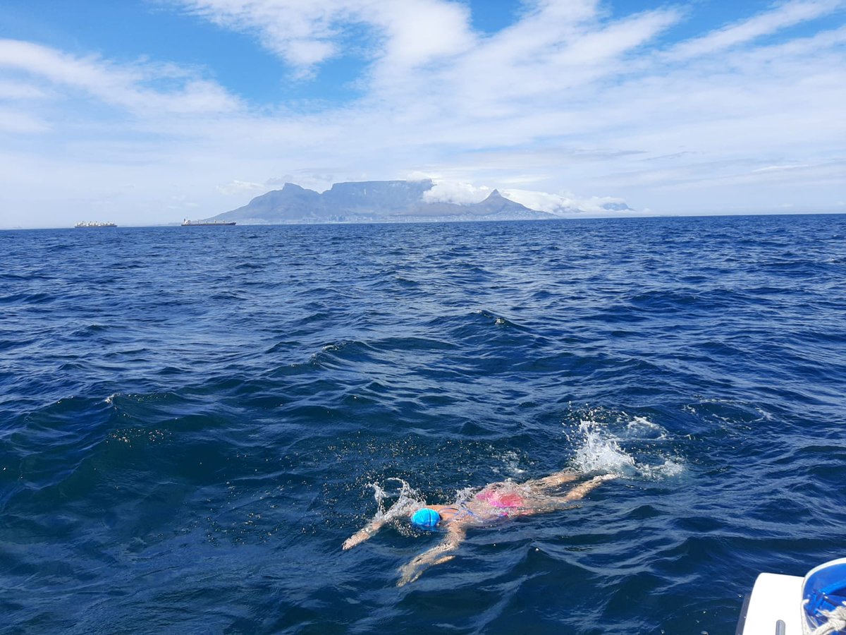 LizzyWalker1's tweet photo. I completed my Robben Island swim yesterday. 3 hours, 16 degrees, 7.6km, a little chop, one crazy current and the mother of all mountains watching over me. Think I’ve finally completed Cape Town. 🇿🇦🇬🇧 🏅 #swimming https://t.co/i8v3hyD5RU