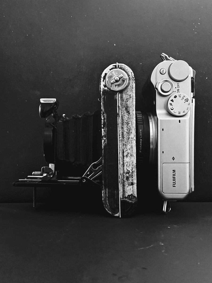 parametricshape's tweet photo. Landscape photography with the antique Kodak bellows camera to Fuji digital camera adapter. https://t.co/poPp2vr2Eg