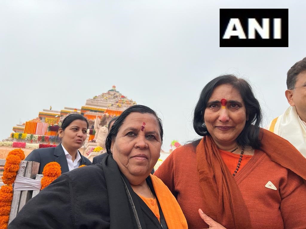 ANI's tweet photo. Ayodhya, Uttar Pradesh | BJP leader Uma Bharti and Sadhvi Rithambara hug each other ahead of Ram Temple Pran Pratishtha ceremony today https://t.co/zfFjPJoVbh