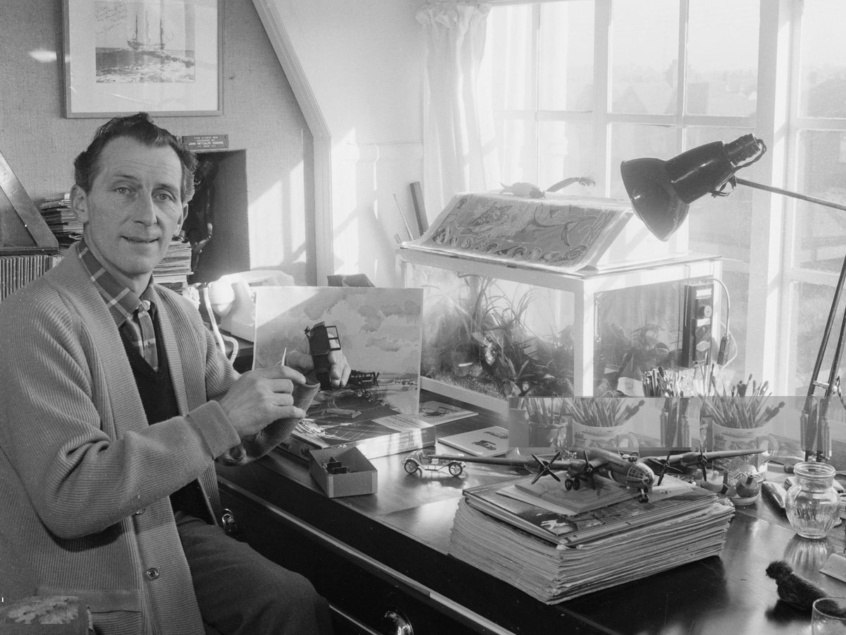 Peter Cushing demonstrates his hobby of making model aircraft at his home in Whitstable, UK, February 1959