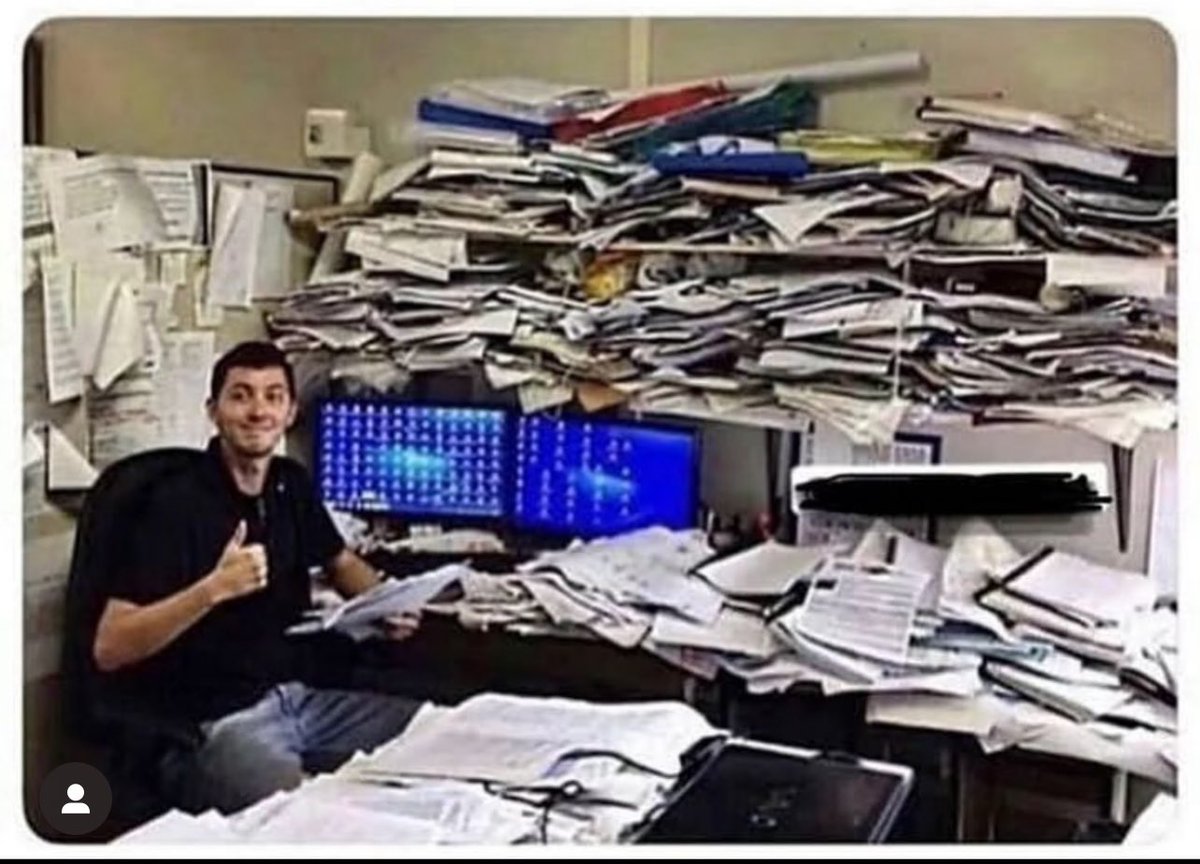 Me and all the papers I’ve downloaded but never read