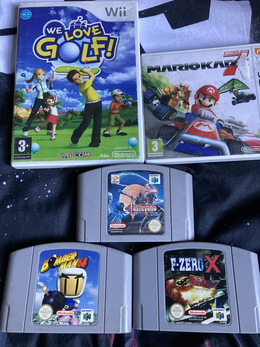 AdrianRavenscr2's tweet photo. This mornings pickups from the local #CEX & #CashMonkey #MarioKart7 was ยฃ8 in Cash Monkey but goes for ยฃ15 in Cex, bargain. Iโm beefing up the #N64 collection and Iโve always wanted to play this #Castlevania happy days ๐ #Nintendo #FZero #Retro #GamersUnite https://t.co/fxy7NV2Ug2