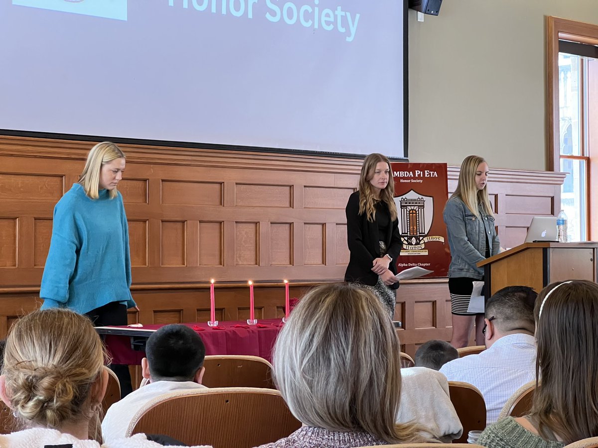 hopecommdept's tweet photo. Before Sunday’s big game we saw our #LambdaPiEta chapter—the @NatComm honor society for communication—proudly welcome the newest inductees with their families on hand. Special keynote also from recent grad Ethan Getchell. Congratulations! 🧡💙 @HopeCollege #StudyCommunication https://t.co/wCrBc0GVJA