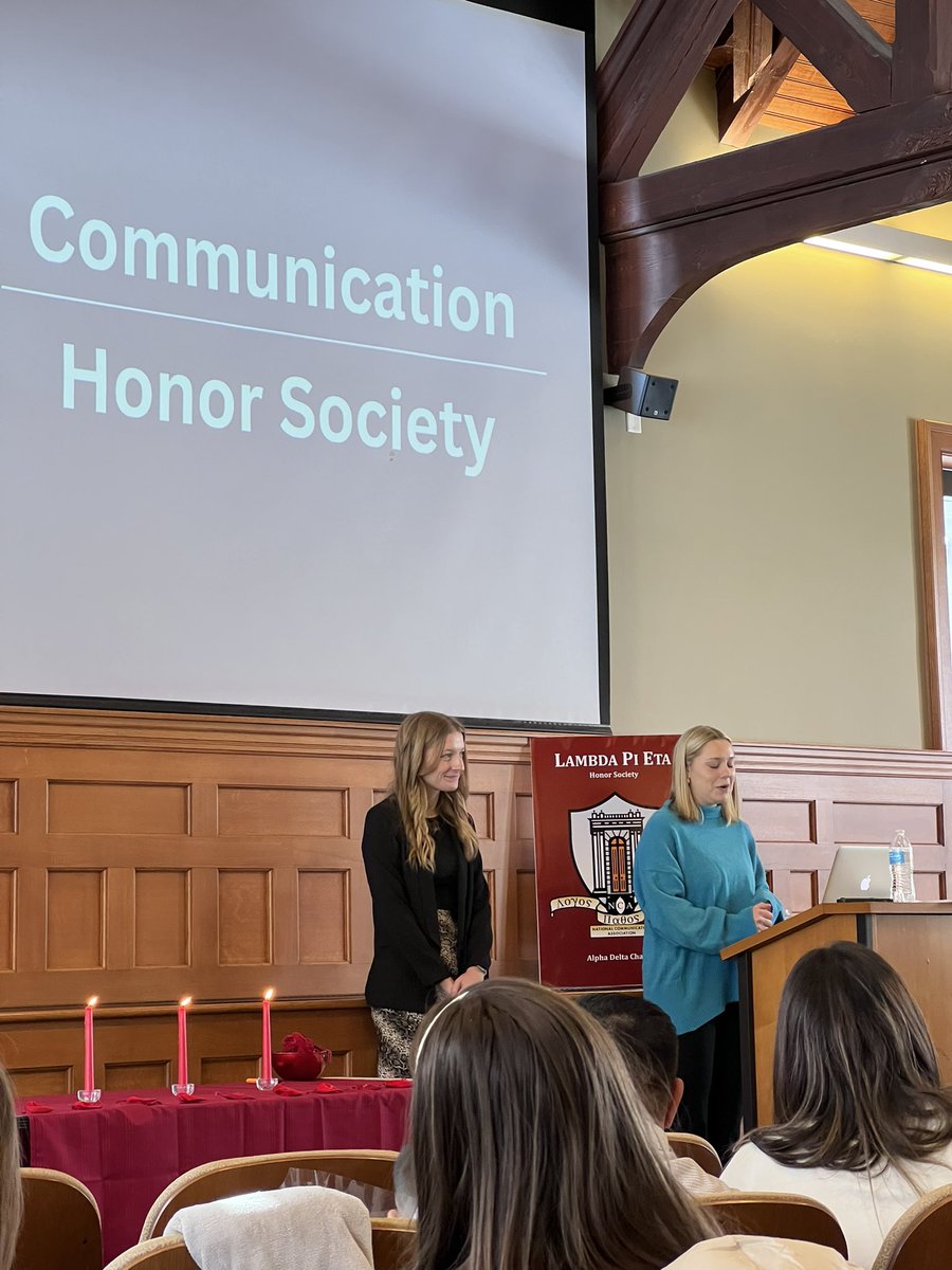 hopecommdept's tweet photo. Before Sunday’s big game we saw our #LambdaPiEta chapter—the @NatComm honor society for communication—proudly welcome the newest inductees with their families on hand. Special keynote also from recent grad Ethan Getchell. Congratulations! 🧡💙 @HopeCollege #StudyCommunication https://t.co/wCrBc0GVJA