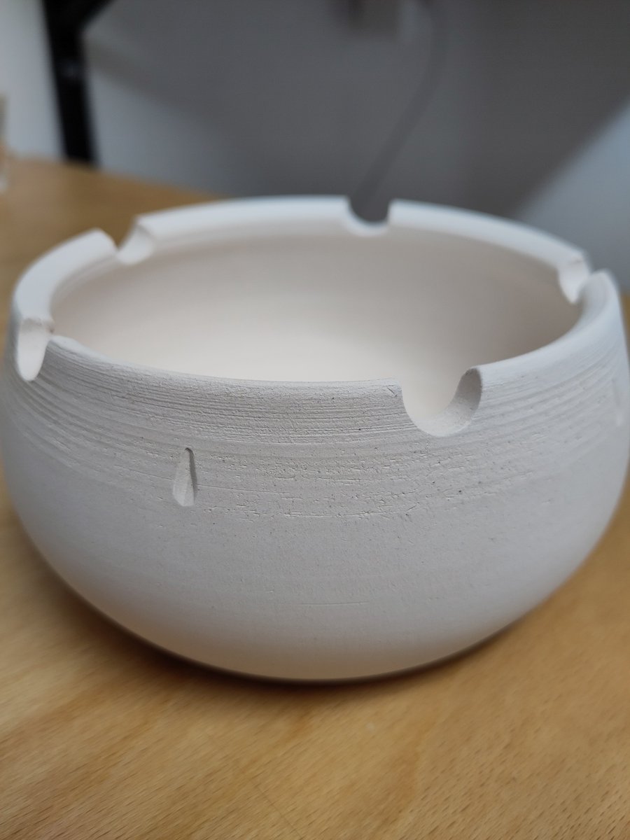 zlatovlas's tweet photo. Ashtray after the bisque fire. This particular body is white without a visible grog. Now it's ready to be glazed. https://t.co/2G1XH7lGTv