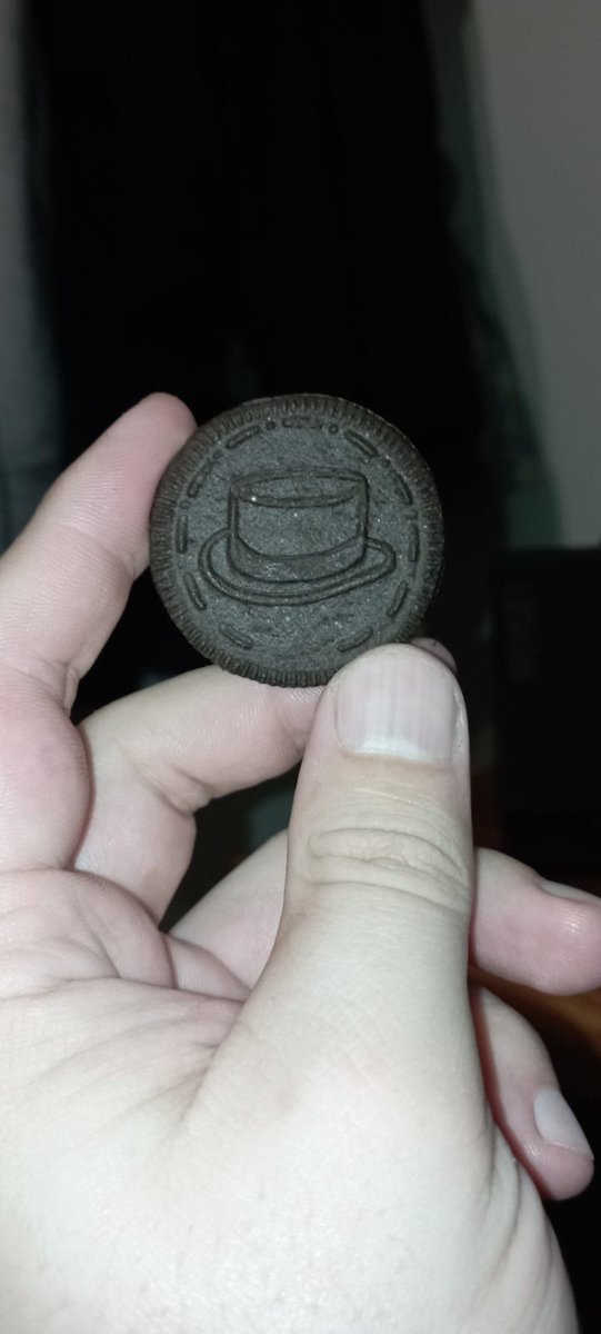 squareworx's tweet photo. @Oreo  legit question, what is up with this Oreo? It was the only one in the pack like this. the rest are normal. and the packaging has no promos on it. was someone naughty at the factory? #oreo #easteregg #unusual https://t.co/SytYNgmVYR