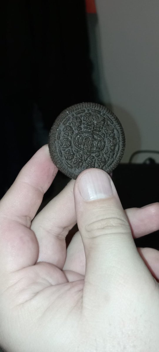squareworx's tweet photo. @Oreo  legit question, what is up with this Oreo? It was the only one in the pack like this. the rest are normal. and the packaging has no promos on it. was someone naughty at the factory? #oreo #easteregg #unusual https://t.co/SytYNgmVYR