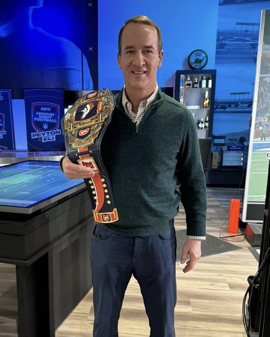 OmahaProd's tweet photo. Doing the ManningCast with Eli is basically like going to the mat in a @WWE Monday Night Raw match, so we can't think of a better Season 3 wrap gift for Peyton. https://t.co/vzMW5DH8LK