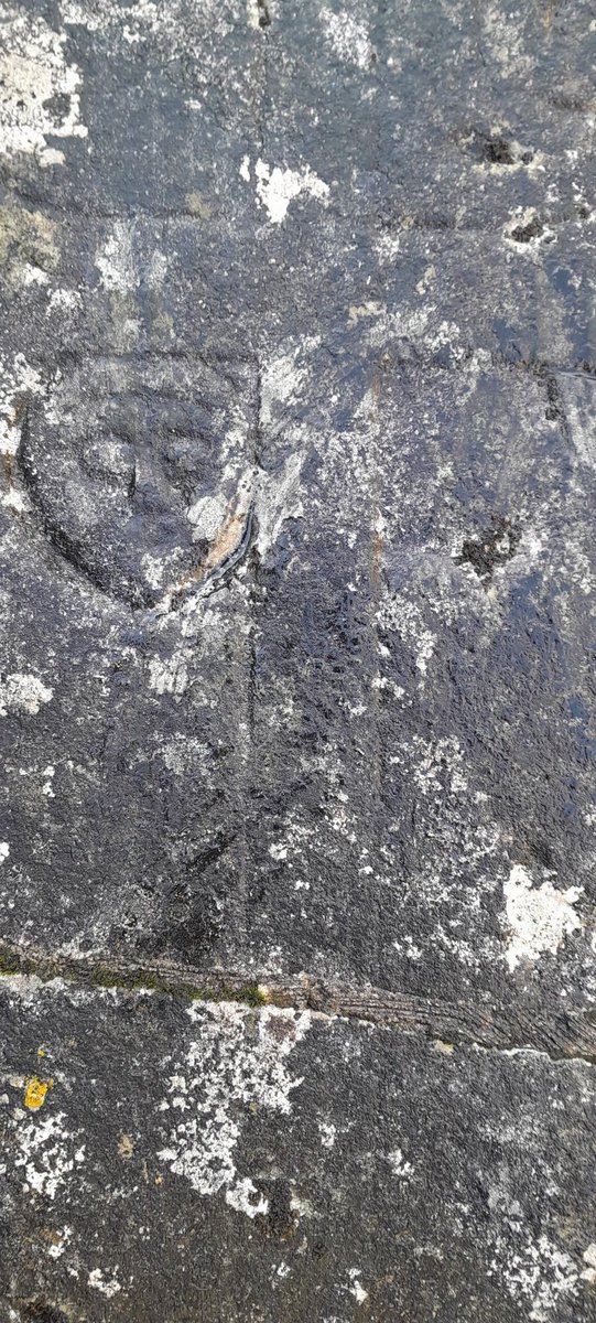 Interesting carved Face on a graveslab in Drumacoo, South Galway.
