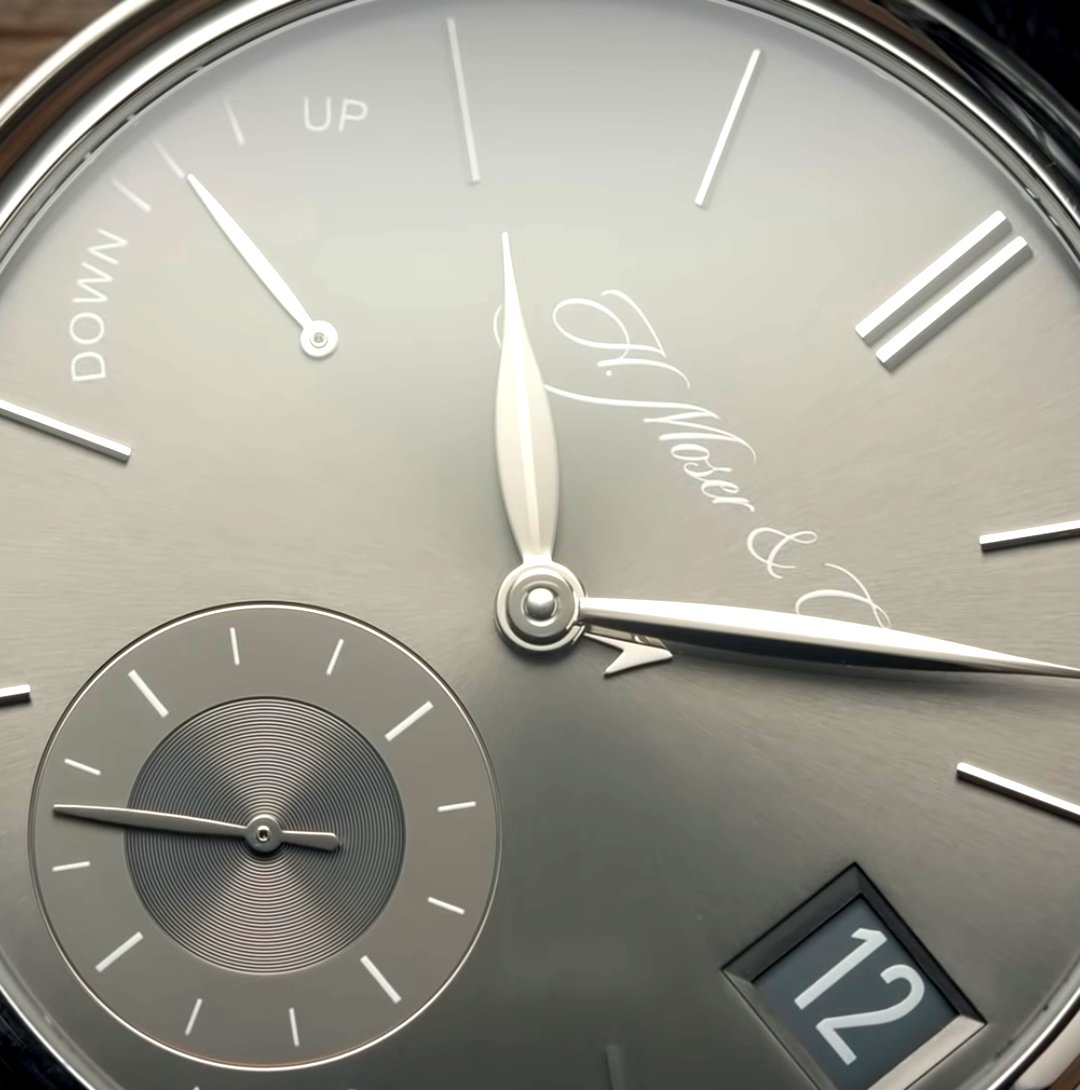 The H. Moser &amp; Cie Endeavour Perpetual Calendar 

~ Functions: Perpetual Calendar - Leap Year Indicator - Power Reserve
~ Case: 40mm – Platinum – 11.1mm Thick
~ Water Resistance: 30M
~ Movement ( HMC 341 ) 168-Hour Power Reserve – Hand Wound – 18,000 vph Frequency – 28 Jewels