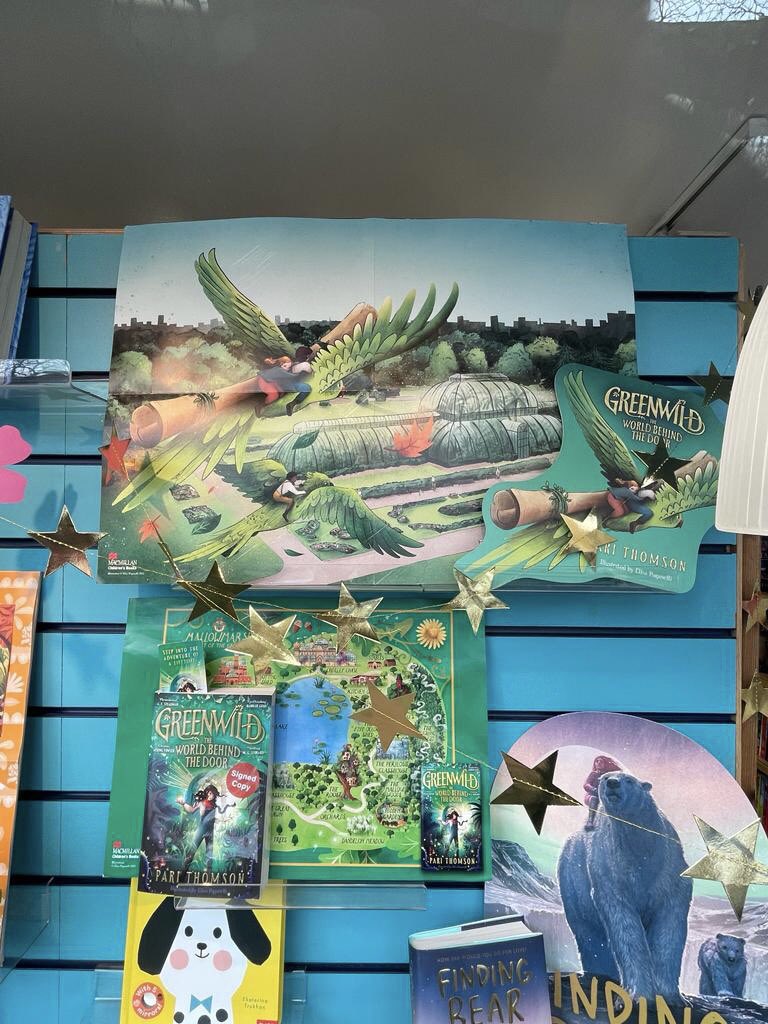 So thrilled to see the brand new #Greenwild paperback at @kewbookshop yesterday - and surrounded by so many amazing books! Plus, look at the amazing window display! 💚✨🌿

🎨@elisaupsidedown 
📚@MacmillanKidsUK