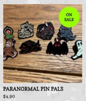 Hey, Pals! 🤗 This January QD's been on bit of a break, but we wanted to let you all know that our Cryptid Pins are currently ✨️On Sale✨️ for 30% Off! We are retiring these, so get them while you can! Link in ALT Text. #cryptids #queer #pins