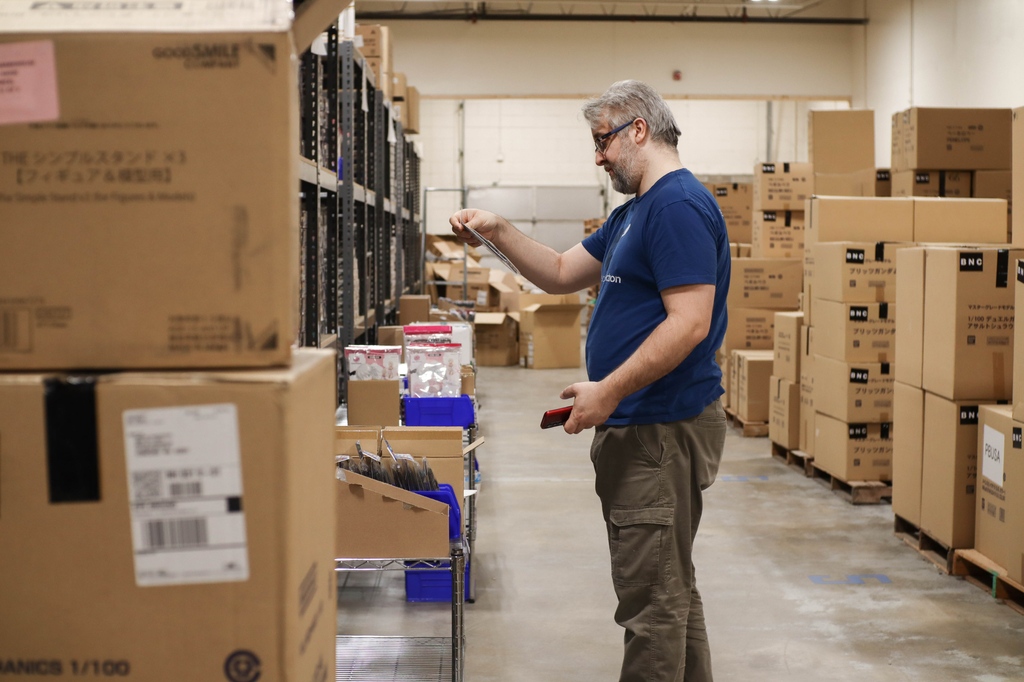 MechaWarehouse's tweet photo. Today in the warehouse: Alex is pulling product to complete orders and Sean is setting up a new cart for smaller items.

#MechaWarehouse #GunplaShop #GundamCommunity https://t.co/N6dImEp4pu