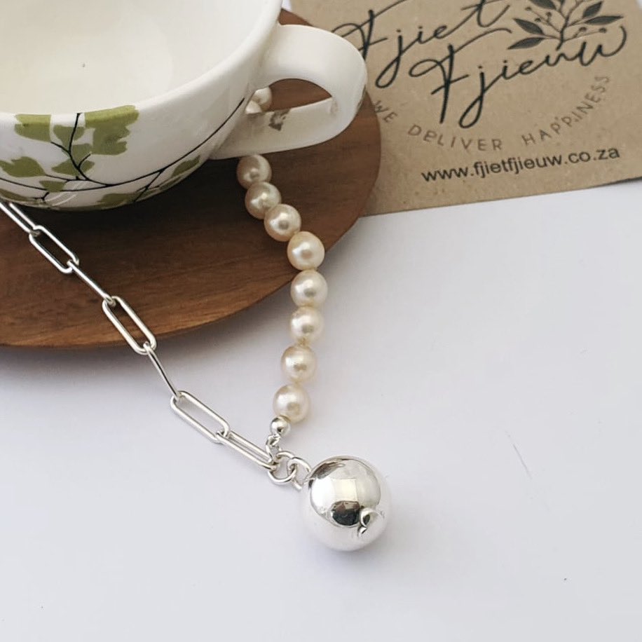 Sterling Silver Paperclip and Repurposed Pearl Chain with Sterling Silver Ball Pendant - Commissioned! 

#sterlingsilver #paperclip #paperclipchain #repurposed #repurposedpearls #semibaroquepearls #chain #ball #ballpendant #letssparkle #fjietfjieuw #wedeliverhappiness