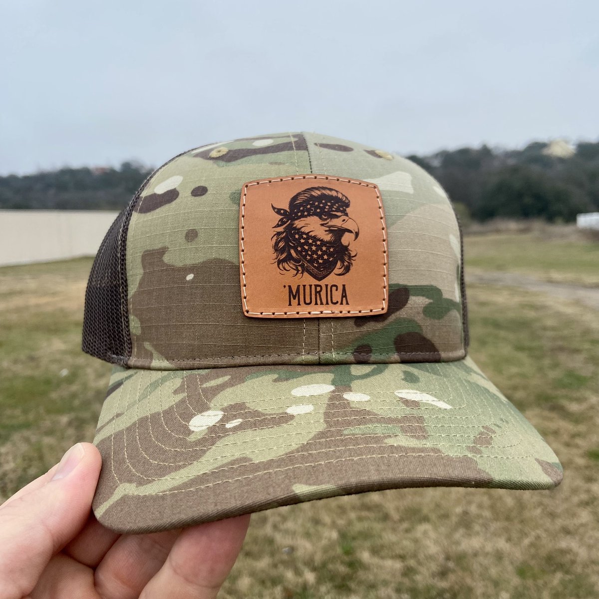 PecuLeatherCo's tweet photo. You don’t love America if you don’t love a patriotic mullet sporting bald eagle. 

And you apparently don’t love America if you serve on the #SCOTUS 

Hats available on our website.
https://t.co/sxbY8tZpkA

#BidenBorderCrisis #10thAmendment https://t.co/r9PWIvohMt