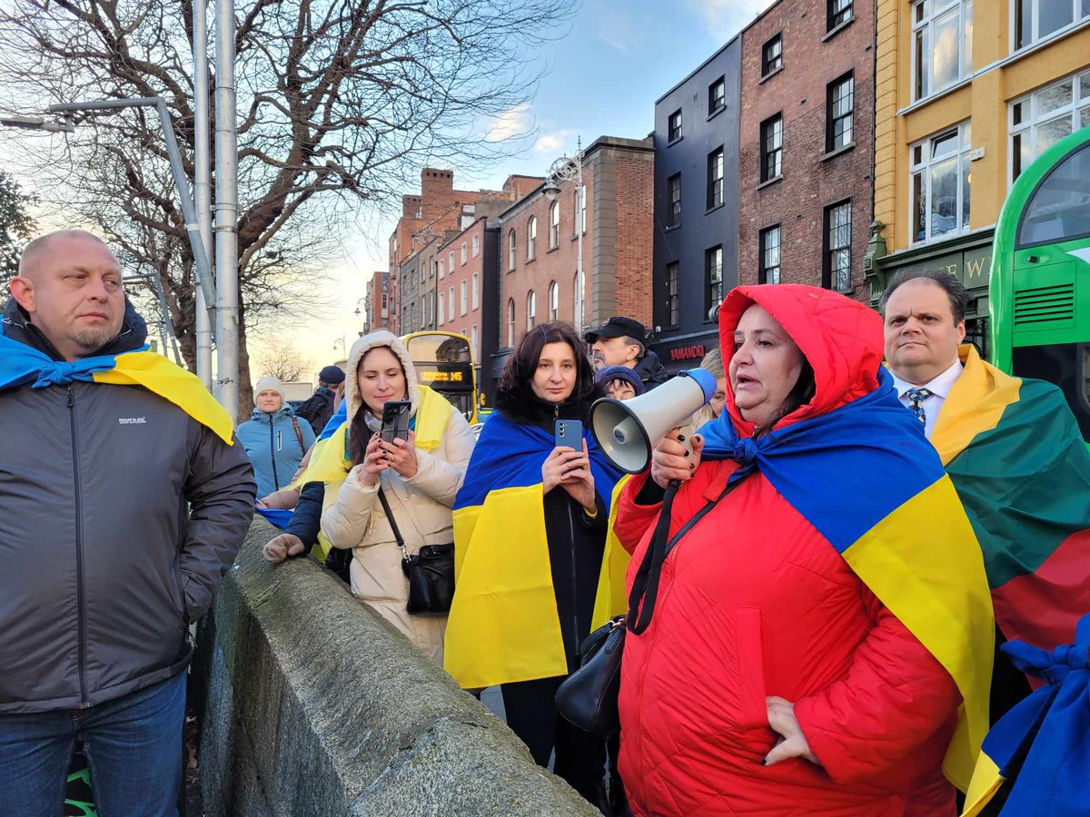 GudynasM's tweet photo. In the face of brutal &amp; unjustified #Russia agression we all became Ukrainians and #UkraineUnityDay is also about us. I am proud to join my friend @GeraskoLarysa &amp; Ukrainian community in carrying huge flag of #Ukraine over the #HaPennyBridge in #Dublin. https://t.co/Z9wgeFZczi