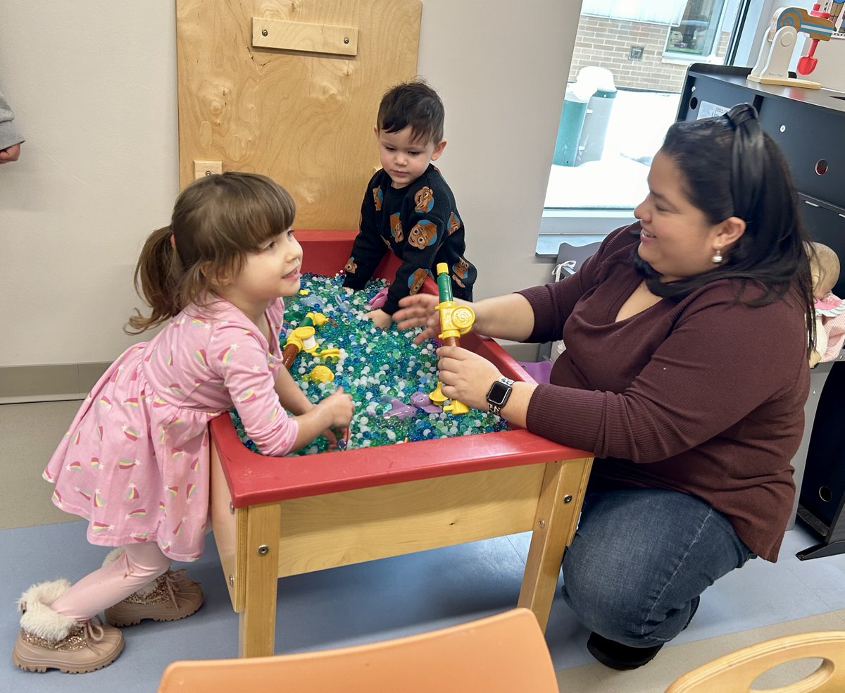 Today at Play-n-Learn Miss Marlyn is engaging families in lots of fun, learning-filled activities. Story time, music &amp; movement, art, and so much more. Awesome work! #1District1Team #D59Cares #D59Learns #EarlyLearning #FamilyFacilitatorsRock