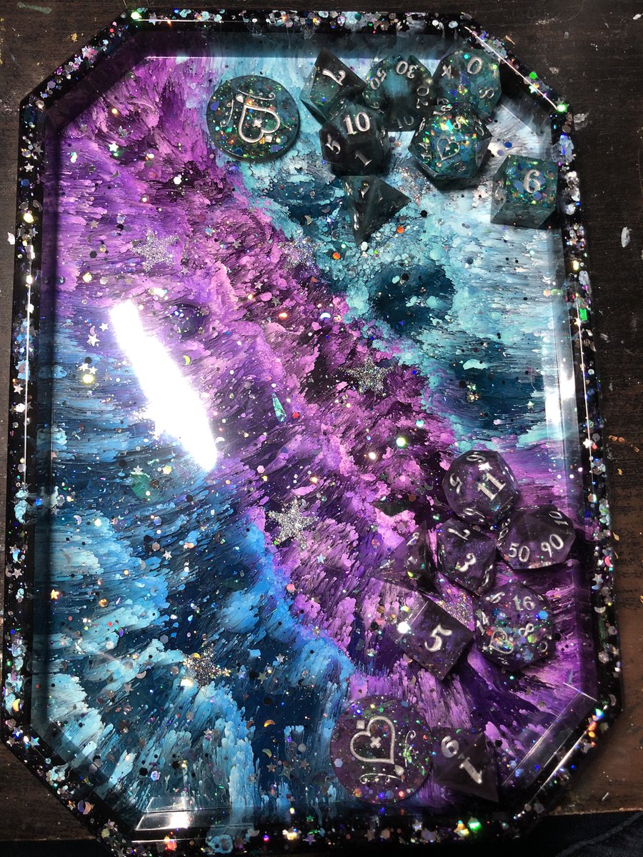 HealersHug's tweet photo. Galaxy petri dice tray. This tray still needs a coat of resin on top to seal in those glitter starsbut hopefully it will be done in time for the shop update Saturday January 27th at 3pm PT
#handmadedicetray #dicetray #dnd #ttrpg #trinkettray #resintray #resindicetray https://t.co/jfbU9xyIGG