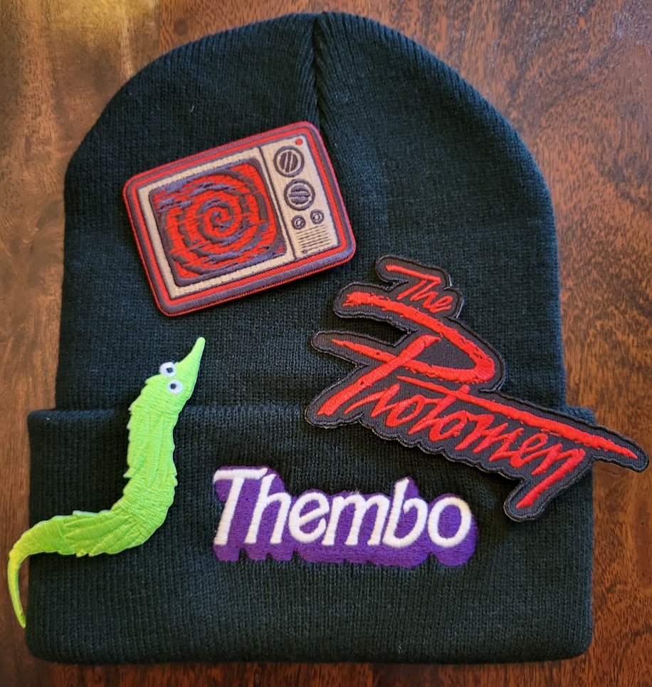 inkimame's tweet photo. Last editions to my haul is an assortment of patches 
-worm: rotoodle 
-tv: @argibi_art [gifted to me by @scoutinurlegion💚]
-logo: @Protomen 
&amp; a beanie from @StudioKitsu! https://t.co/Vz9Om4V9Ar