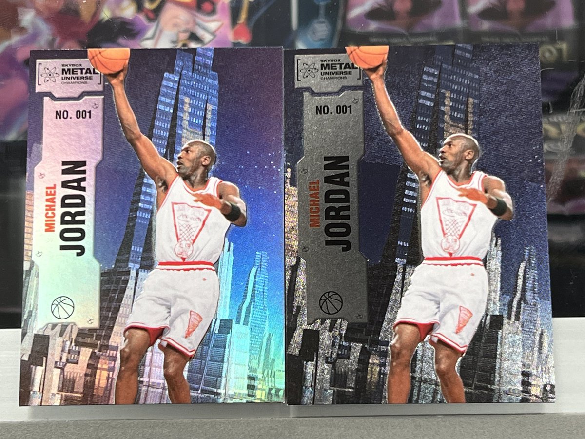 We just opened 8 hobby boxes of 2022 Upper Deck Metal Universe Champions. In one of the boxes, all of the 1-100 base cards were on a different shinier stock like the card on the left. Anybody know what that is?  <a href="/UpperDeckSports/">Upper Deck</a> #preciousmetalgems