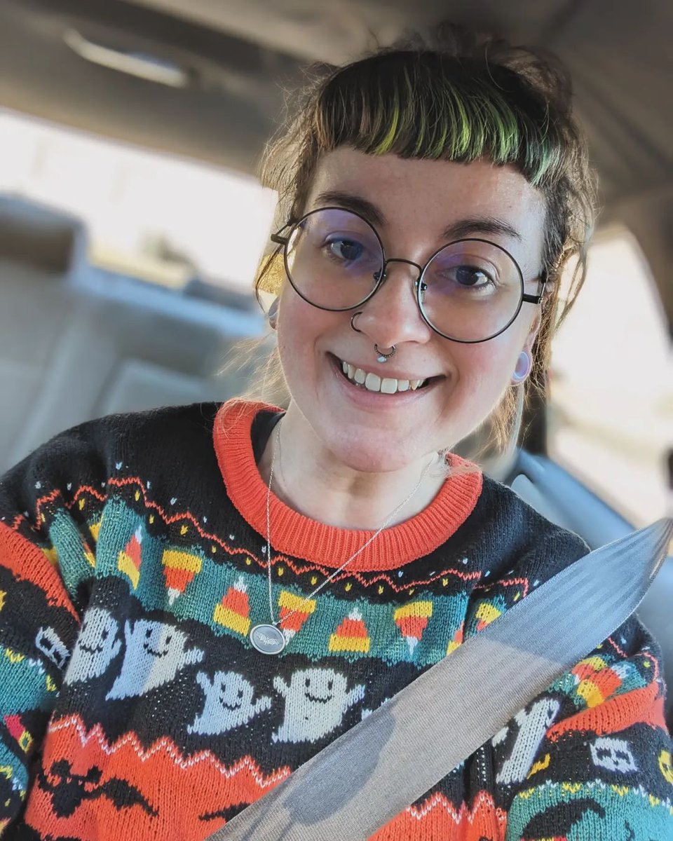 Cold January days aren't stopping @spooky_rainbow_ghoul from making it Halloween every day in the fright night delight faire isle sweater 👻 l8r.it/t8cy #halloweeneveryday #spookyfashion #winterwear #sweaters